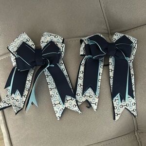 2 bows with hair ties attached